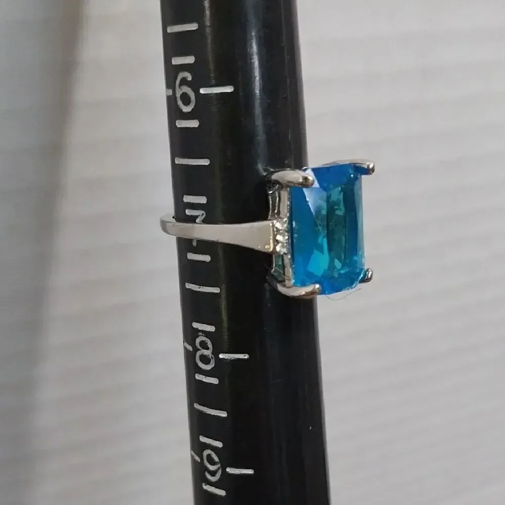 Unlisted Silver Ring with Vibrant Blue Gem..it Is In perfect Condition b